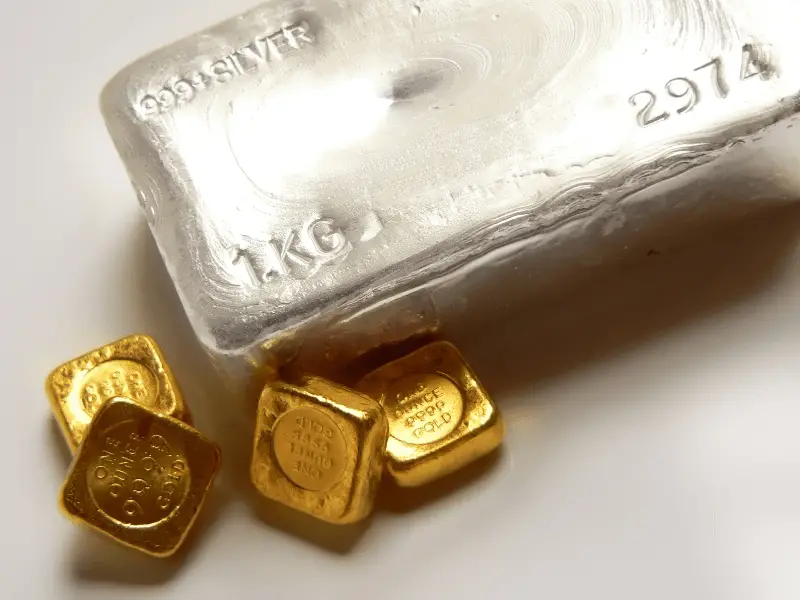 A photo of a gold and silver bar